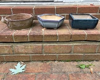 Outdoor clay, ceramic and metal pottery