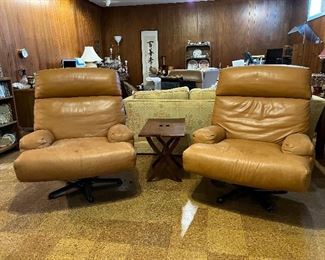 2 Brown Leather Swivel Lounge Chairs