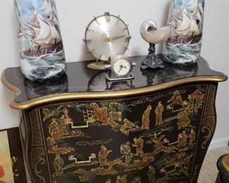 Drexel Chinoiserie chest of drawer, Bavaria Germany ship porcelain vases, vintage Europa mantle clock, nautilus shell on silver plated stand