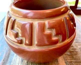 Redware Pueblo Pottery by Lee Ann Tafoya of Santa Clara, New Mexico. Excellent condition. Measures 7.5d x 6h. Book included and offers a detailed look at the artists and craft. Reference inventory #7. $550 
