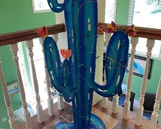 The Blue Cactus. Vintage modern Metal Sculpture by Prescott, signed and dated ‘88. Measures 22w x 25d x 51.5h and heavy! Additional numbers on sculpture SA 028. Hand painted hand welded; turquoise and cobalt blue with splatters of desert yellow, pink,black. Excellent condition. One bloom shows a minimal paint chip. Reference inventory #2.  $750
