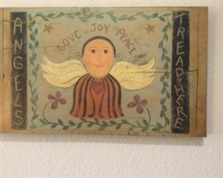 Many hand painted plaques