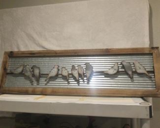 12 by 41 inches, metal birds on metal siding, wood frame