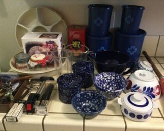 Blue Tupperware canister set, wine tools, pie cutter, broom, 