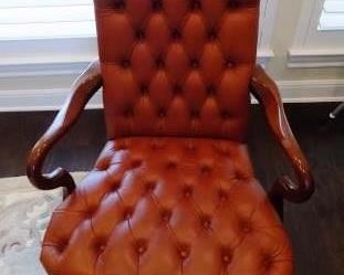 LEATHER EXECUTIVE OFFICE CHAIR - COMFORTABLE.  RUST ORANGE COLORED LEATHER