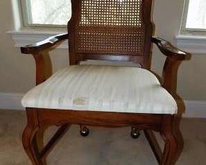 WICKER ROLLING CHAIR - SEAT FABRIC IS FRAYED