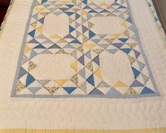 Pair of quilts with pillow shams 