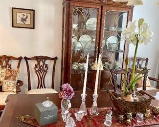 Table has one leaf and 8 chairs