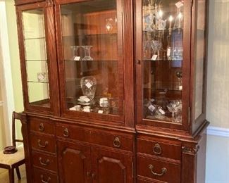Hekman breakfront with lighted interior & glass shelves