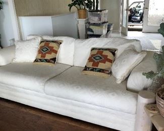 2 white sofas 