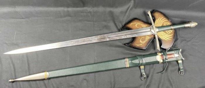 Official Lord of the Rings Gandalf 'Glamdring' Sword, by United Cutlery.
Sword Overall Length: 46.5"
Blade Length: 36"
Scabbard Length 39.5"
Excellent pre-owned condition!

 Glamdring (also called the Foe-hammer and the Beater) was a hand-and-a-half sword, forged for Turgon, the Elven King of Gondolin during the First Age, and much later owned by the wizard Gandalf.