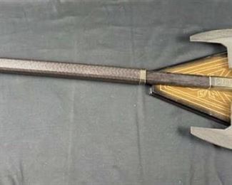 Official Lord of the Rings Gimli Axe, United Cutlery w/ Wall Mount.
Overall length: 37.5"
Blade Width: 11.5"
Excellent Pre-owned condition! Heavy piece!
Gimli's "walking axe" was the longest weapon used by the dwarf Gimli (and by his father, Glóin, before him).