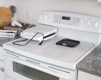 Electric range and microwave oven