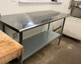 Several Stainless Steel Prep tables