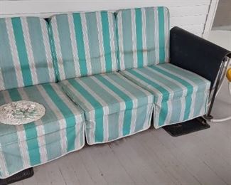 Mid Century outdoor items. Iron glider, patio tables