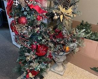 planters with holiday topiaries