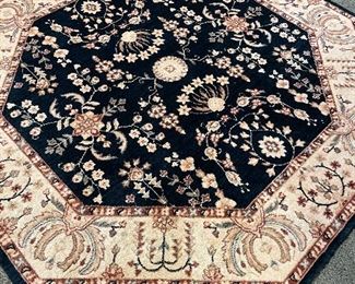Octagonal wool area rug