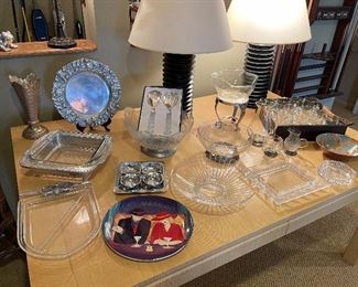 Matched set of table lamps (black base); glassware and pewter appetizer serviceware; dining table 