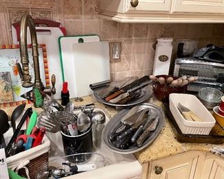 Kitchen Essentials; Wusthof knives, pyrex dishes, wood-handled steak knives; toaster oven; knife sharpener