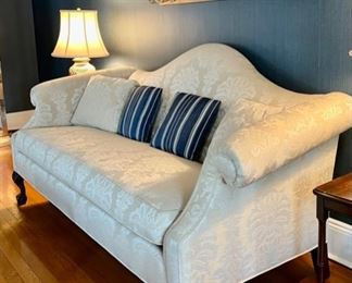 White camel back sofa