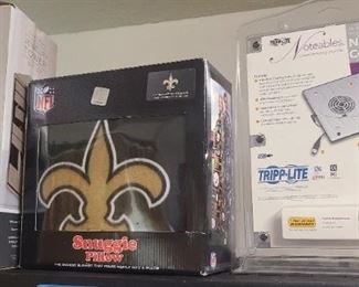 The Saints snuggie pillow (unopened) 
Trippilite notebook cooling pad
Jewelry tower