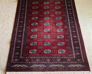 Red Hand Woven Oriental Area Rug is 69in x 48in