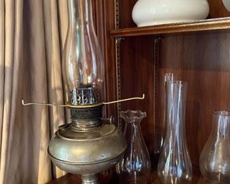 Aladdin lamp; a variety of lamp chimneys