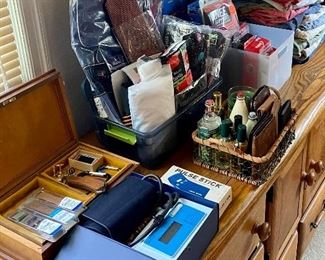 Leather wallets, pocket knives, new heart rate monitors, books, cassettes, an office full of computer equipment, storage, discs, lights, monitors, Nest products, webcams, keyboards, office supplies and more.  