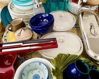 Kitchen items such as Italian ceramics, Pfaltzgraff dish set, salmon steamer, bowls, carving sets and more. 