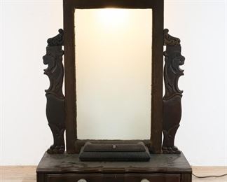 6	Victorian Vanity Mirror and Dresser Set	"Victorian vanity mirror and dresser set. English, Late 19th Century. Mahogany, Venetian glass mirror, crystal drawer knobs, vanity jewelry box set in front of mirror. Carved supports on top of lion carvings were previously repaired. Carved lions are loose. Lighting has been tested and works. 
41"" H x 30"" L x 12"" D"

