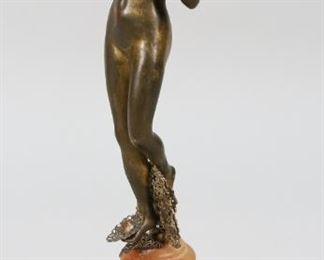 19	Art Nouveau Nude Bronze	Art Nouveau female nude bronze. Hardstone base with gilt filigree at feet, gilt bat mounted on the bottom. Inscribed on the underside MD. 13" H x 4 1/4" base diameter. Wear to patina on bronze. Line to front of hardstone base. Chip to base.
