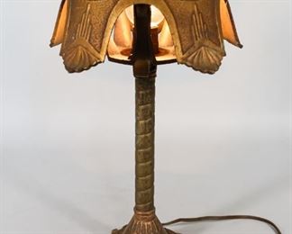 27	Markel Art Deco Iron Table Lamp	Markel Art Deco painted iron table lamp. Marked on the underside on shade MEP Inc. Pat. Appl for. B.676. 16" H x 6" base diameter. Later painting to the surface. Scuffing to the stand.
