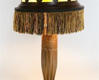 28	Trench Art Table Lamp	"Trench art table lamp with slag glass shade. Stamped on bottom Paris France with trade mark. 
22"" H x 5 1/2"" Base diameter."
