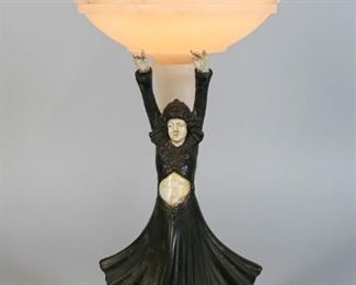 35	JB Hirsch Style Alabaster & White Metal Lamp	Art deco figural white metal and alabaster lamp, possibly J.B. Hirsch. White metal figure with molded plastic / rubber hands, mounted on a two-part alabaster lamp base. 5 3/4" x 6" base, 15 3/4"H to top of shade. Wear to paint on hands, face and stomach, minor wear to patina in figure. Scratches to alabaster throughout, chips and roughness to alabaster base, works - exposed wires on plug.
