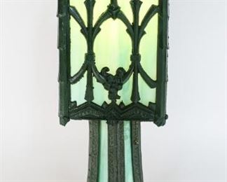 36	Arts & Crafts Metal Slag Glass Lamp, EF Industries	"Arts & Crafts metal slag glass lamp by EF Industries. Early 20th century. Marked on the underside. Separate switches light up the base and shade. Paint loss to base.
21 1/2"" H x 9 1/2"" Base diameter."
