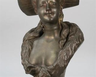 40	After Louis Hottot White Metal Bust of a Woman	After Louis Hottot (French, 1829-1905) white metal bust of a woman. Circa 19th Century. Signed on the base, lower right. 19" H. Scuffing to the surface.
