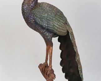 43	White Metal Peacock on Branch	"Patinated white metal peacock on branch. 
24 3/4"" H x 7 1/4"" Base diameter."
