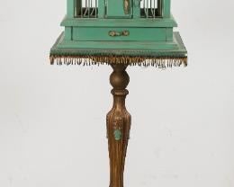 45	Victorian Bird Cage and Fishbowl Stand	"Victorian bird cage and fishbowl stand. English, late 19th/early 20th century. Victorian pedestal with green painted bird cage with two faux birds, topped with a fitted fish bowl. Some wear around base of bird cage. 
51"" H x 12"" diameter of bowl"
