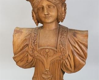 56	Walnut Carved Wood Ship's Figurehead	Carved walnut figurehead from a sailing ship. A maiden with flowers in her hair, some splits and separations to wood. 26 1/2" Tall 17" Wide 8" Deep
