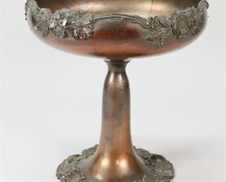 72	Adelphi Silverplate Art Nouveau Tazza	Adelphi silverplate art nouveau tazza. Marked on the underside, form number 485. 10 1/2" H x 9 1/4" diameter. Scuffing to the exterior and interior of the bowl.
