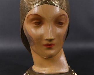 74	Flapper with Head Cap Lamp	"Figural flapper head lamp with chain applique. 
13"" H x 7 1/2"" base diameter. Not tested. Crazing to paint throughout.
"
