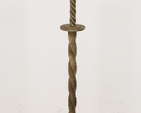 83	Bronze Art Nouveau Stand	Bronze Art Nouveau stand. Coiled and scaled stand with metal top. Floral appliques around the base. Bronze snake signed within a cartouche on verso. 48 1/4" H x 15" top diameter. Restoration to paint on stand top.
