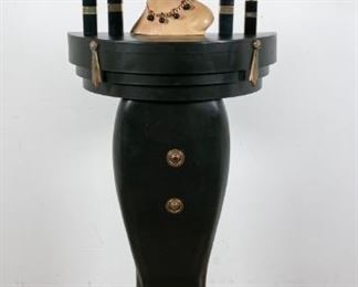 122	Chanel Bust and Body Pedestal Outsider Art Piece	"Chanel bust and body pedestal outsider art piece. Late 20th Century. Painted wooden female bust wearing a costume jewelry necklace with four Chanel perfume bottles (no perfume inside) sitting atop a body form composite pedestal. Left finial on pedestal previously repaired, metal top previously repaired. Wear and loss throughout bust. 

65"" H
"
