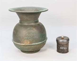 130	Early 20th Century Tobacco Spittoon and Tin	"Early 20th Century tobacco spittoon and tin. American, Early 20th Century. A brass Redskin Brand Chewing Tobacco Cutplug spittoon. A tobacco tin with 'BULL' and ""SHIT"" stamped on sides. Heavy rusting and wear throughout both objects.

Largest measures 10"" H x 9"" diameter"
