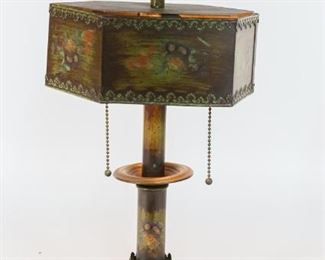 135	Arts & Crafts Table Lamp	"Art & Crafts table lamp with metal shade and two lights.
Shade is slightly bent and does not line up with the top.  Overall: 19"" x 6"" Base diameter."

