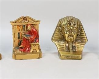 138	2 Pair PM Craftsman & LV Aronson Figural Bookends	2 pair of figural bookends. Pair L.V. Aronson polychrome white metal bookends monks reading, each marked L.V. Aronson 1920 Made in USA, 6 1/2"H; pair of brass PM Craftsman King Tut bookends, unsigned, each 6 1/4"H. Paint loss and wear to decoration, chips to top of one on Aronson bookends; minor scratches and wear, discoloration, oxidation to King Tut bookends.
