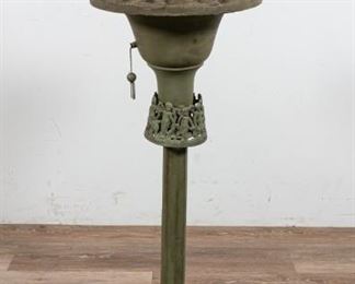 139	Figural Fairy Polychromatic Lamp on Stand	"Figural fairy polychromatic lamp on stand. 20th Century. A Victorian painted cast iron plant stand with a parade of amorini around center of post, topped with a faux bronze of a fairy girl kissing a frog. Polychromatic light bulb included with remote, changing color, luminosity, frequency and brightness. Lighting has been tested and works.

45"" H x 15"" diameter of base
"
