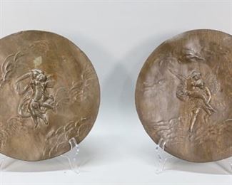 149	2 Art Nouveau Patinated Pewter Plaques	"2 Art Nouveau patinated pewter plaques. Allegorical scenes. Both inscribed on edge lower right, Twilight and Dawn in French. Stamped Etain Garanti, Pur on verso. 12 1/2"" diameter. Restoration and unevenness to the patina. Loss to patina on Dusk plate, center left and center. 
"
