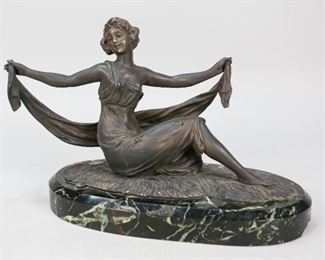 158	French White Metal Sculpture Seated Lady	French white metal sculpture seated lady with shawl. Foundry mark Fabrique Francaise Paris, Made in Paris around a burning crucible. Circa 1890-1915. Mounted on a marble base. 10"L x 5"W x 8"H. Wear to patina on lady's head, chip to base lower right. Drill hole to back of lady's head.
