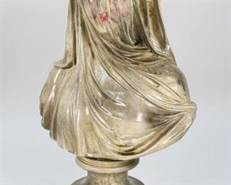 160	After Antonio Frilli Composite Bust	After Antonio Frilli (Italian, 1806-1902), After the Veiled Virgin by Raffaelo Monti (Italian,1818-1881), composite bust mounted on wooden base. Inscribed on the underside A. Frilli Firenze Italy. 15 1/2" H. Later painting to the face and wreath of flowers. Line to front of bust, bubbles, casting imperfections to the surface.
